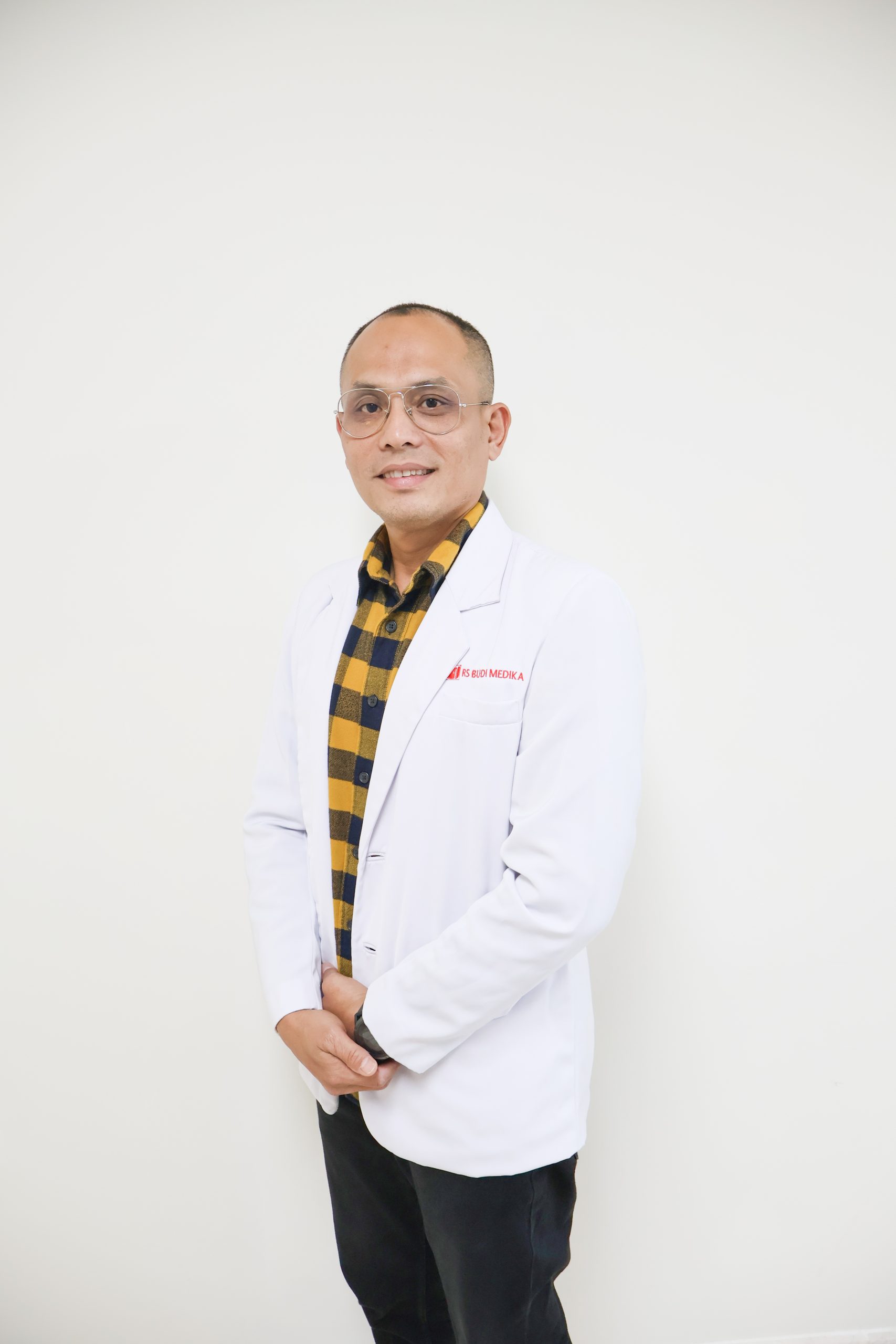 dr. Ronny Adrian, Sp.OG, Subsp. F.E.R, D.Mas, F.ART